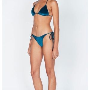 Never worn! Color is off in my photo, it is closer to the online photo.